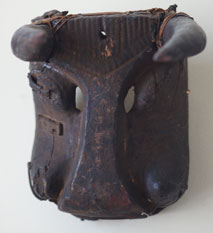 African mask of bull, really cool with all kinds of repairs with wire and metal pieces